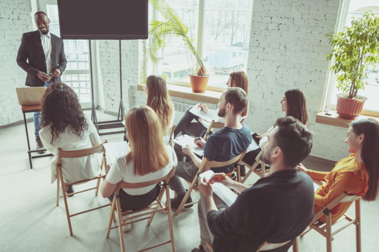 Business team collaborating with automated financial dashboards and reports